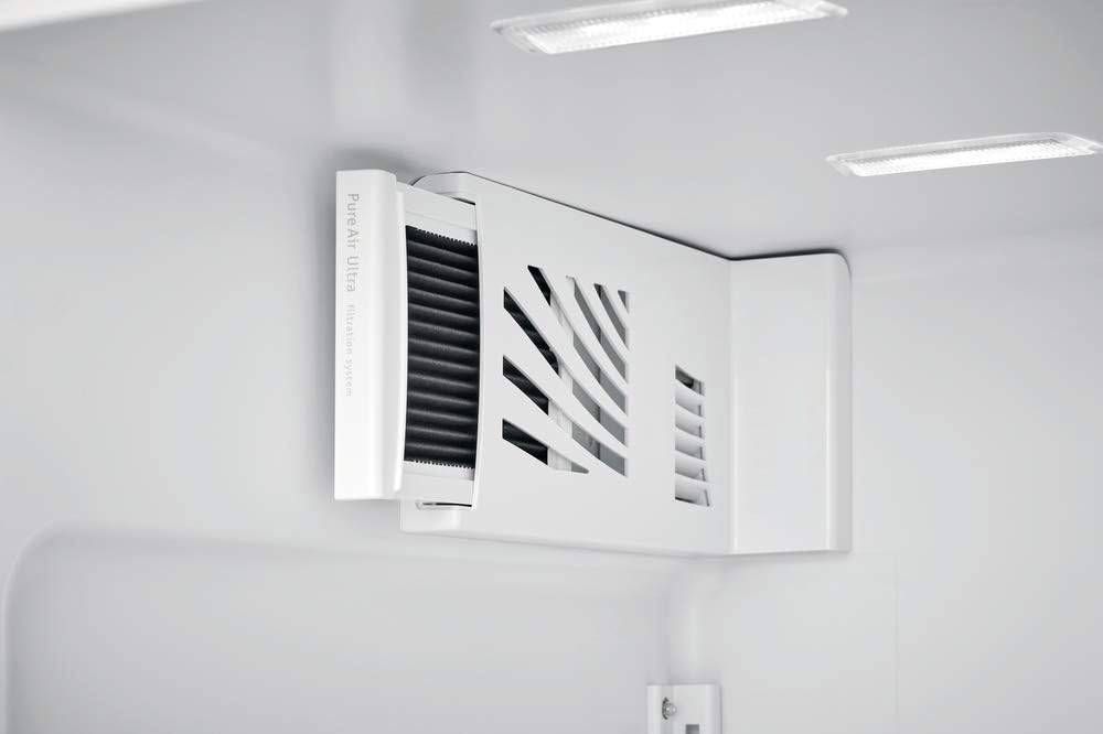 Air conditioning vent on a white wall with visible brand logo